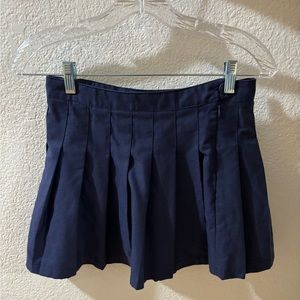 Three Pleated Mini Skirts